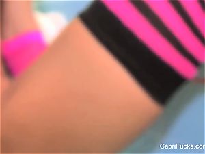 Capri wanks in a peruke and striped socks