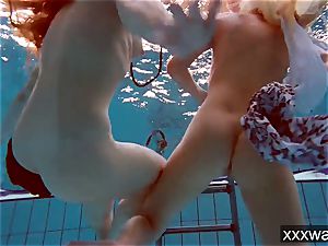 steaming Russian femmes swimming in the pool